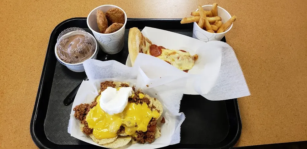 Nachos Pepperoni Pizza Chicken Strips French Fries Chocolate Brownie Ice Cream with Caramel
